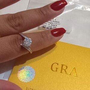 Elegant Diamond Rings with Red Nails